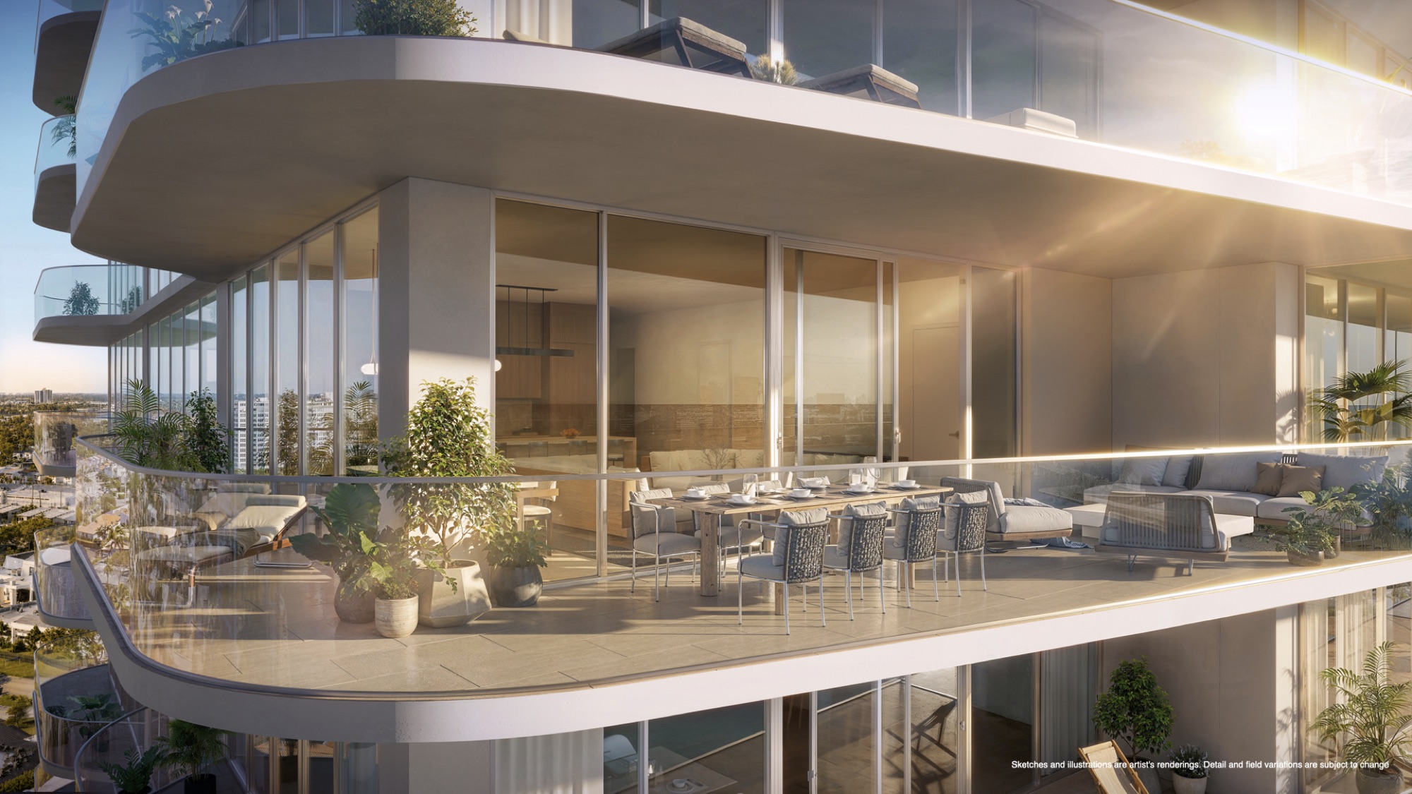 Living room and terrace at Continuum 12000 — floor-to-ceiling glass opening to an oversized balcony over Biscayne Bay, with travertine porcelain flooring flowing indoors and out. Interiors by Paul Duesing Design Partners.